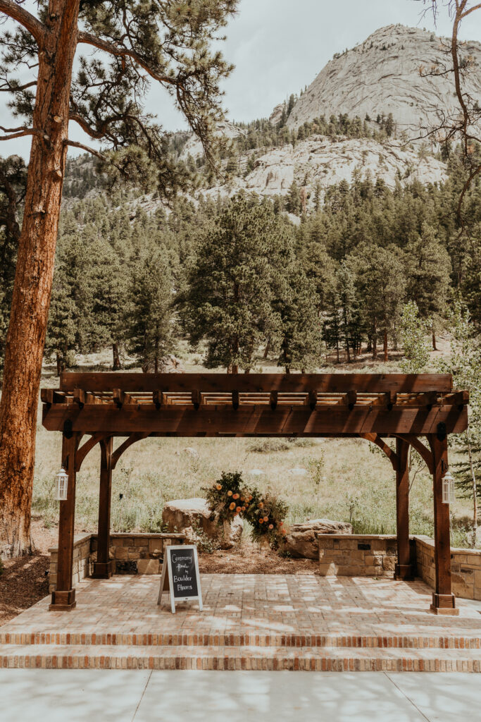 Della Terra Mountain Chateau outdoor ceremony site with mountains in the background