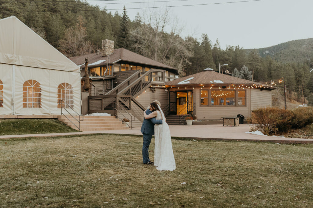 Couple hugging after wedding ceremony at Boulder Creek by Wedgewood Weddings