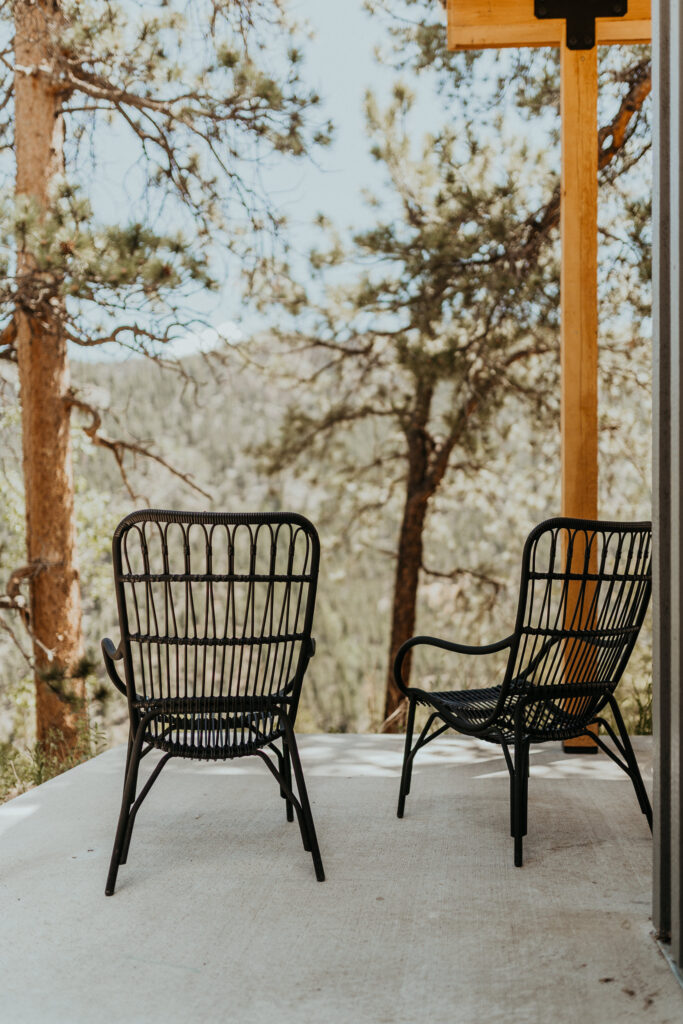 Chairs looking into the woods outside of North Star Gatherings