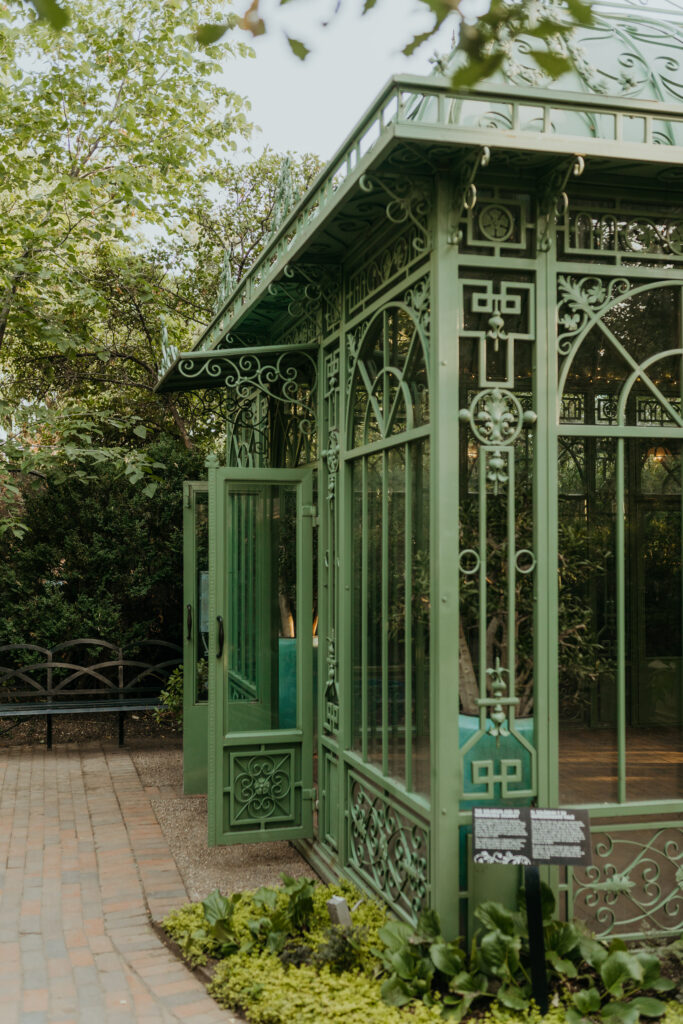 Mosaic Gallery Exterior Details of Green Iron Walls